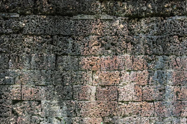 Antiguo muro de ladrillo rajado naranja — Foto de Stock