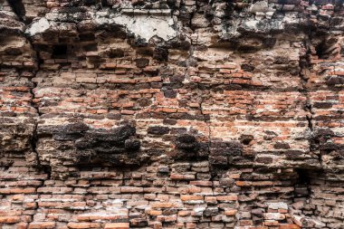 eski turuncu kırık tuğla duvar