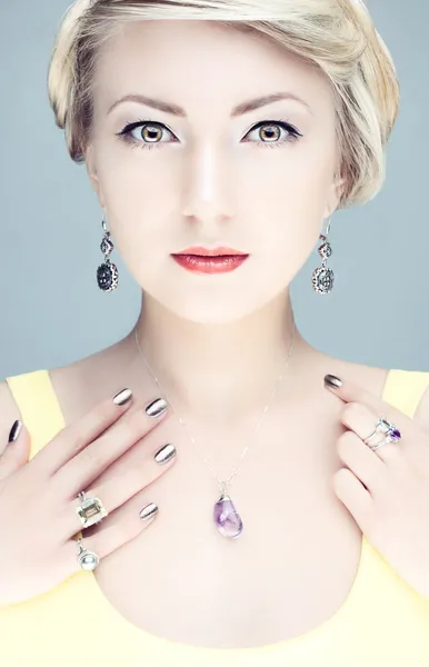 Portrait of a blonde in a yellow dress — Stock Photo, Image