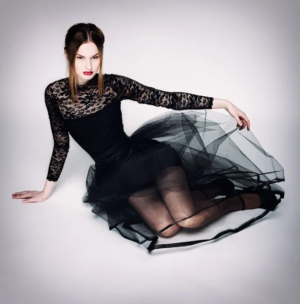 Dreamer in a black dress. — Stock Photo, Image