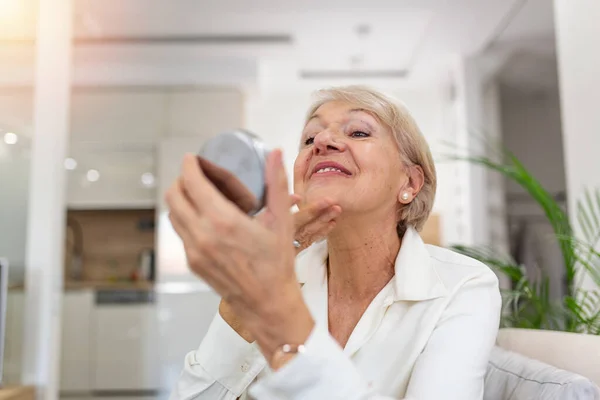 Senior Old Woman Applies Face Wrinkles Looks Mirror Plastic Surgery — Stockfoto