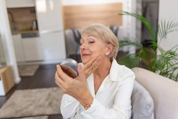 Senior Woman Looking Mirror Applying Wrinkles Face Cream Mature Adult — Stockfoto