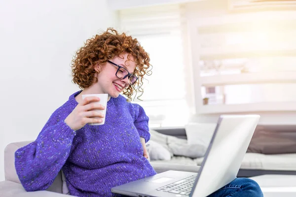 Positive Young Woman Freelancer Watching Video Blog Netbook Having Coffee — Foto Stock