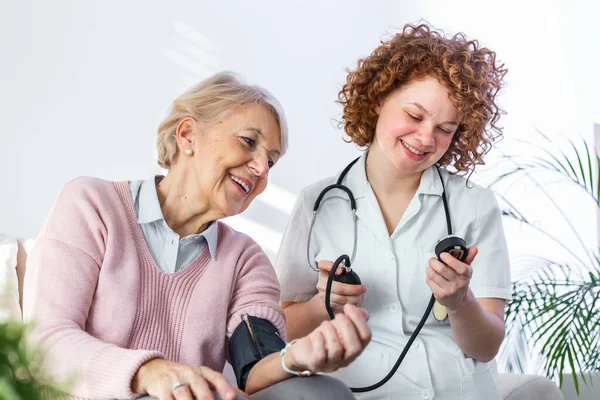 Happy Senior Woman Having Her Blood Pressure Measured Nursing Home — Stock Photo, Image