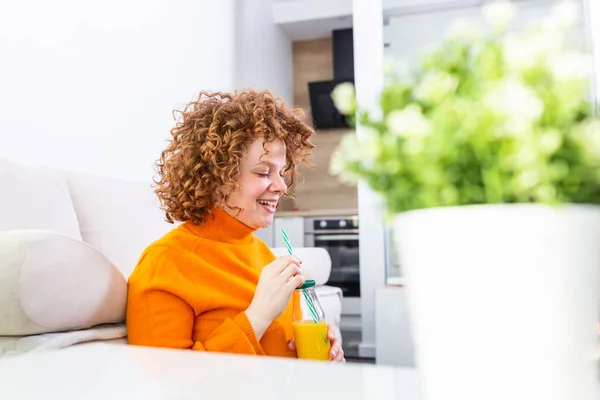 Image Young Red Hair Woman Drinking Orange Juice Surfing Internet — 스톡 사진