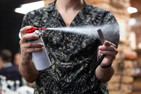 Master Disinfecting Shaving Instrument Use Young Man Spray Antibacterial Liquid — Stock Photo, Image