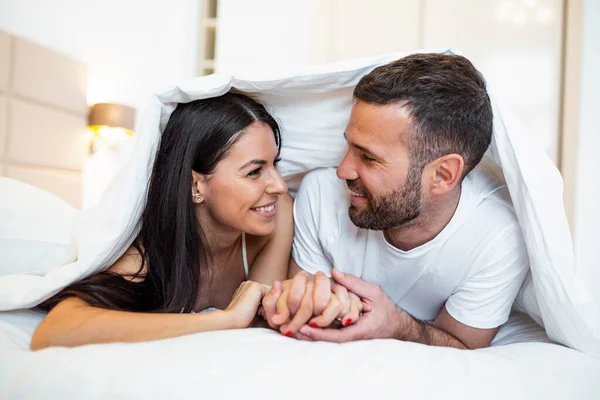 Smiling Couple Going Kiss Sleeping Sheets Morning Love Young Happy — Stockfoto