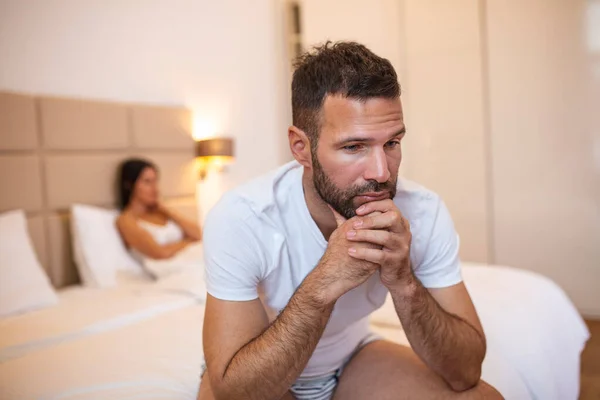 Beautiful Girl Frustrated Man Sitting Bed Looking Each Other Upset — Φωτογραφία Αρχείου