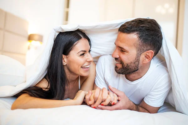 Smiling Couple Going Kiss Sleeping Sheets Morning Love Young Happy — Foto Stock