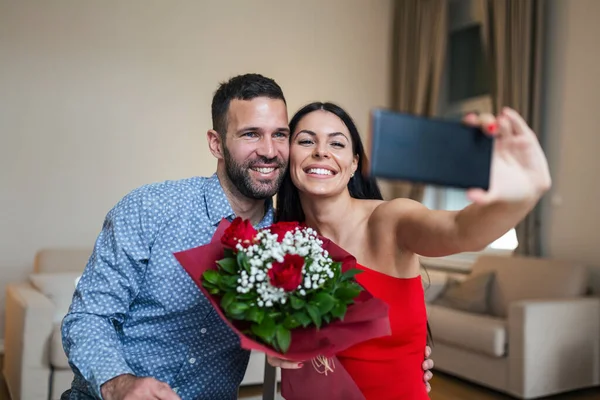 Image Happy Young Couple Taking Selfie Photo Flowers While Having — Stock Photo, Image