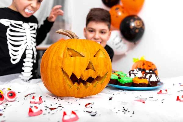 Happy Halloween! the pumpkin Jack O\' Lantern Halloween pumpkin with carved smile for family holiday at home