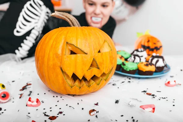 Happy Halloween! the pumpkin Jack O\' Lantern Halloween pumpkin with carved smile for family holiday at home