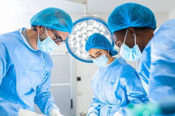 Urgent Surgery Professional Smart Intelligent Surgeons Standing Patient Performing Operation — Stock Photo, Image