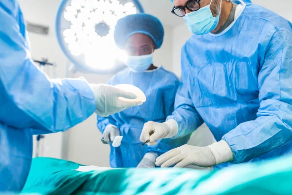 Surgeon His Assistant Performing Cosmetic Surgery Hospital Operating Room Surgeon — 스톡 사진