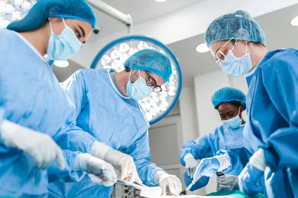 Diverse Team Professional Surgeon Assistants Nurses Performing Invasive Surgery Patient — Foto de Stock