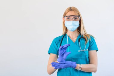 Doctor or nurse with an injection vaccine for covid-19 or corona virus. Coronavirus, Covid-19, virus outbreak or medical mask concept