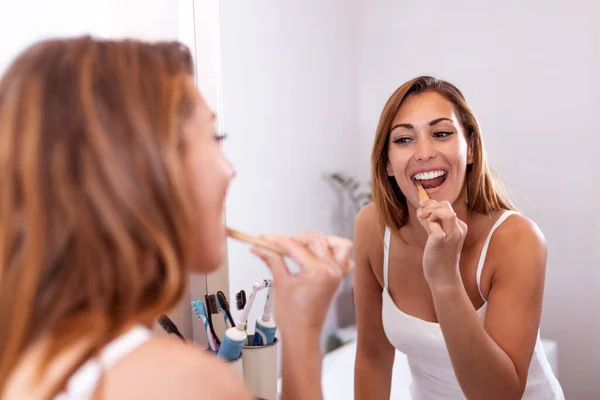 Portrait Attractive Woman Brushing Teeth Bathroom Looking Mirror Reflection Healthy — Foto de Stock