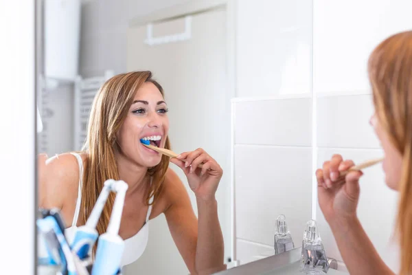 Portrait Attractive Woman Brushing Teeth Bathroom Looking Mirror Reflection Healthy — Fotografia de Stock