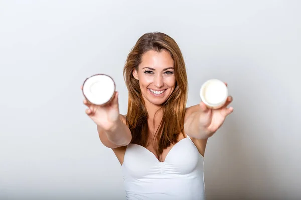 Cheerful Young Woman Holding Half Sliced Coconut Both Hands Nut — Φωτογραφία Αρχείου