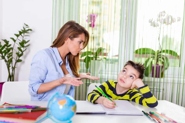 Child Having Problem Concentration While Doing Homework Stressed Mother Son — ストック写真