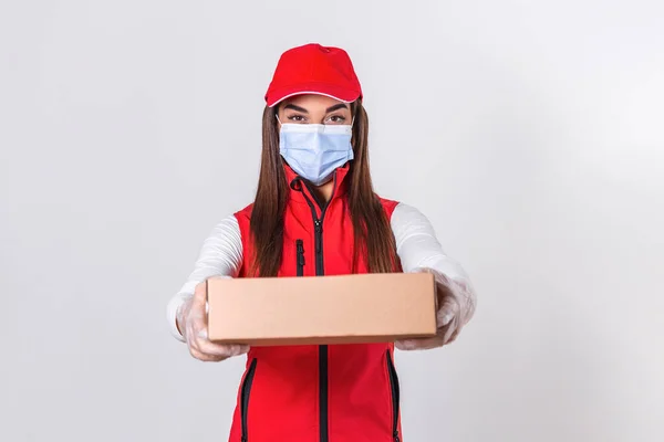 Young Delivery Woman Medical Mask Holding Carrying Cardbox Isolated White — Stock fotografie