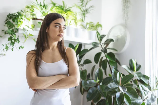 Portrait Young Woman Next Green Plants Looking Away Flowerpot Loves — стоковое фото