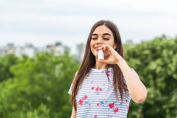 Young Woman Using Nose Spray Her Pollen Grass Allergies Allergy — стоковое фото