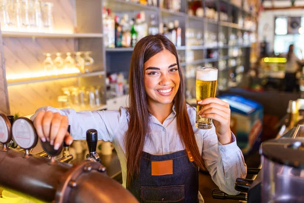 Beautiful Smiling Female Bartender Serving Draft Beer Bar Counter Shelves — Foto Stock