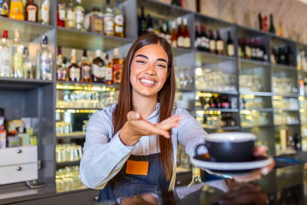 Beautiful Female Barista Holding Cup Hot Coffee Looking Camera Smiling — Foto Stock