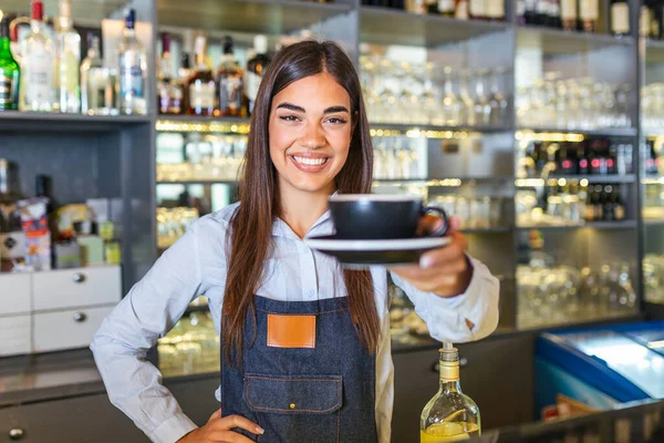 Beautiful Female Barista Holding Cup Hot Coffee Looking Camera Smiling — Foto Stock