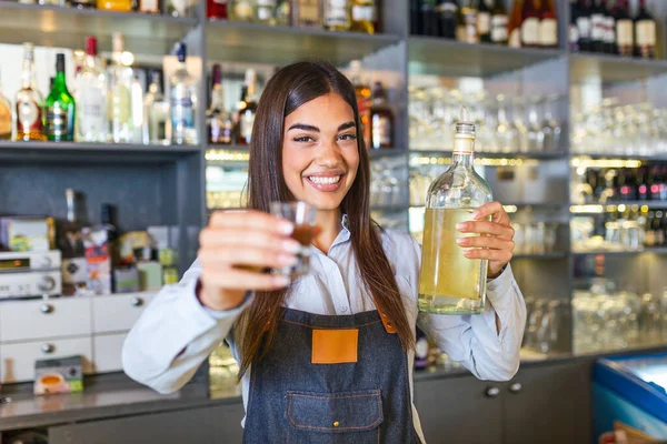 Beautiful Female Bartender Holding Shot Glass Alcohol Drink Bottle Other — Stok fotoğraf
