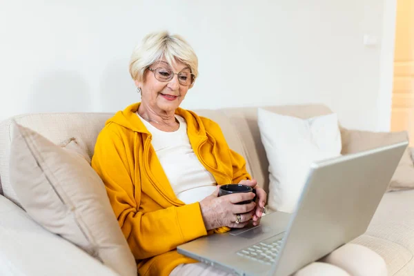 Senior Woman Spends Home Leisure Laptop Smilling Elderly Woman Sits — Stock Photo, Image