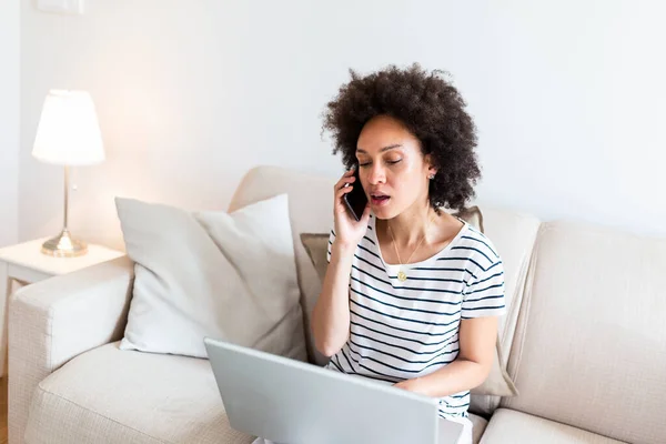 Woman Sitting Sofa Laptop Talking Phone Home Young Successful Businesswoman — Stock Photo, Image