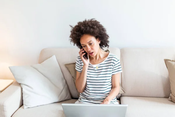 Woman Sitting Sofa Laptop Talking Phone Home Young Successful Businesswoman — Stock Photo, Image