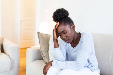 Health And Pain. Stressed Exhausted Young black Woman Having Strong Tension Headache. Closeup Portrait Of Beautiful Sick Girl Suffering From Head Migraine, Feeling Pressure And Stress.