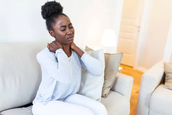 Young Black Woman Feeling Pain Neck Sitting Sad Home Bed — Stock fotografie