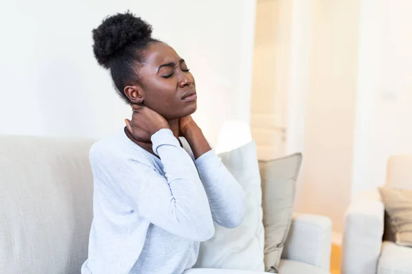 Young Black Woman Feeling Pain Neck Sitting Sad Home Bed — Stock fotografie