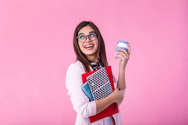 Smiling girl student or woman teacher portrait with books and coffee to go in hands. education, high school and people concept - happy smiling young woman teacher in glasses