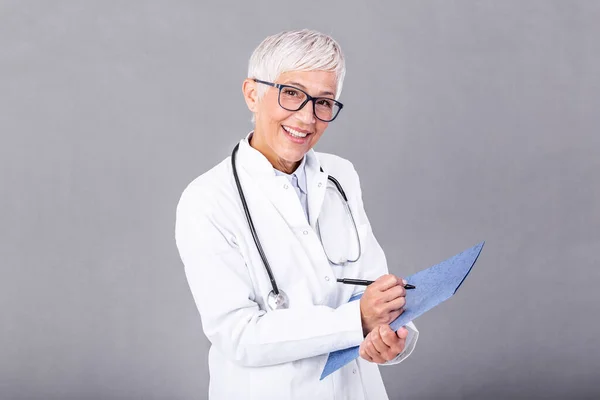 Happy Smiling Senior Female Doctor Writing Clipboard Isolated Background Medicine — Zdjęcie stockowe