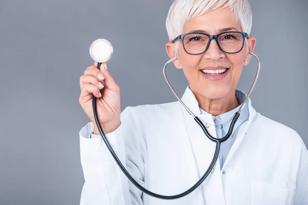 Female Mature Doctor Stethoscope Hands Isolated Background Doctor Holds His — Stock Fotó
