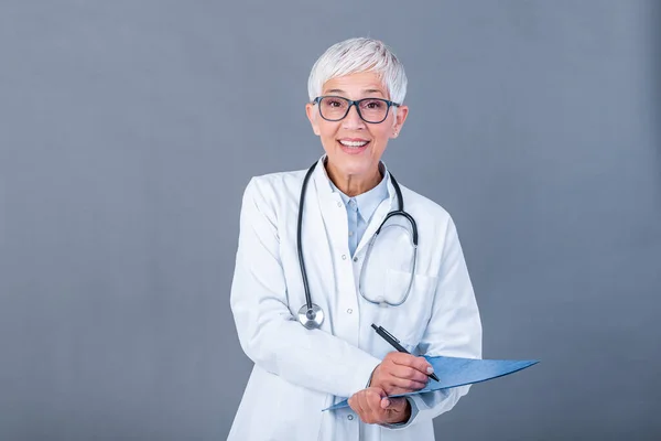 Happy Smiling Senior Female Doctor Writing Clipboard Isolated Background Medicine — Φωτογραφία Αρχείου