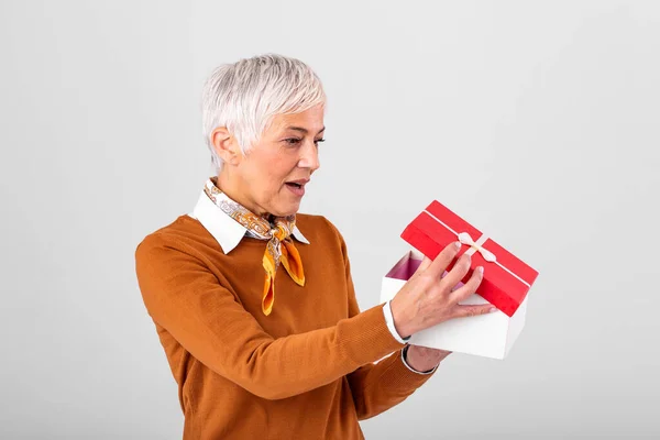 Portrait Happy Smiling Mature Woman Opening Christmas Gift Box Isolated — Stock Photo, Image