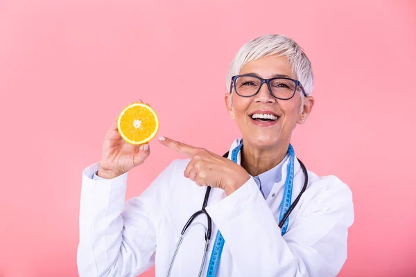 Middle Aged Nutritionist Woman Holding Orange Fruit Happy Big Smile — Φωτογραφία Αρχείου