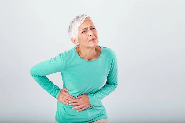 Elderly Woman Gray Hair Touching Her Aching Hip Upset Mature — Stockfoto