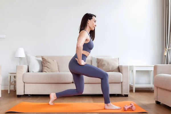 Home Workout Woman Doing Aerobics Warming Flexibility Leg Stretching Exercises — Stock Photo, Image