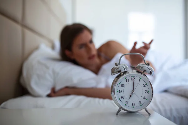 Woman Lying Bed Turning Alarm Clock Morning 5Am Hand Turns — Stock Photo, Image
