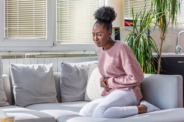 African American Woman Painful Expression Holding Hands Belly Suffering Menstrual — Stok fotoğraf