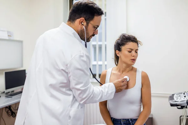 Caring Doctor Hold Stethoscope Listen Patient Heart Chest Hospital Young — Stock Photo, Image