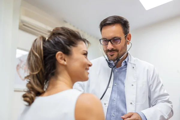 Caring Caucasian Male Doctor Use Phonendoscope Examine Female Patient Heart — Stock Photo, Image