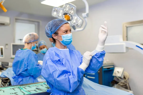 Portrait Beautiful Female Doctor Surgeon Putting Medical Gloves Standing Operation — 스톡 사진